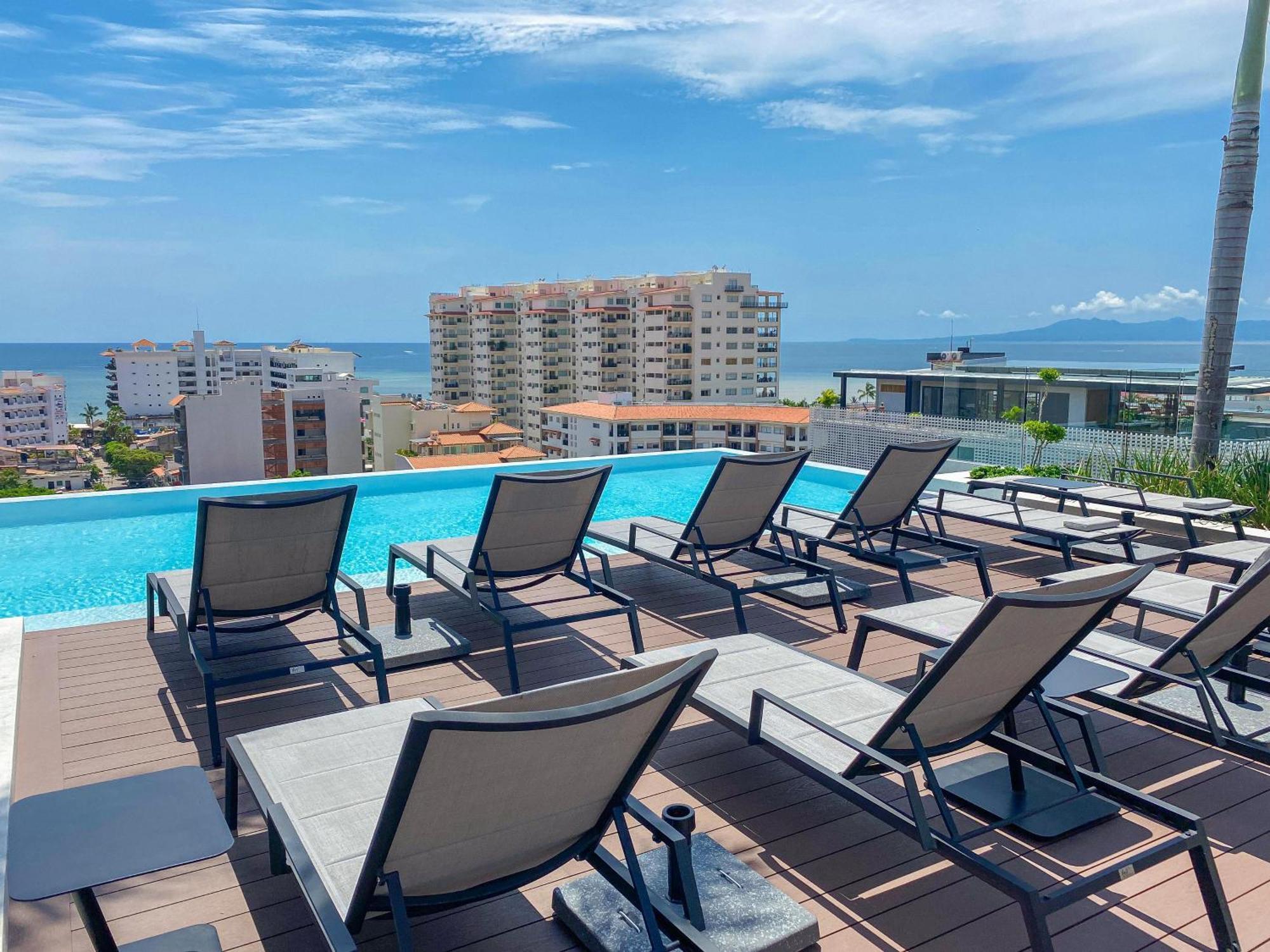 Holiday home Lounge On Big Balcony, Pool And Gym