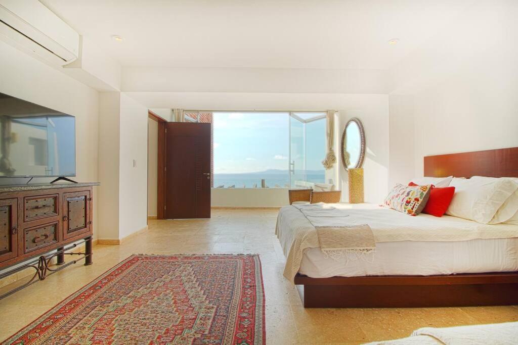 Two-story Beachfront Oasis *