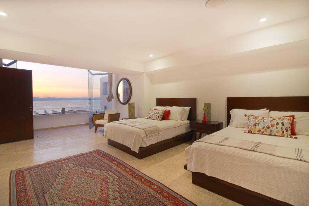 Two-story Beachfront Oasis Apartment Puerto Vallarta