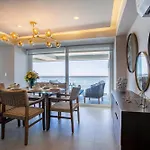 Upscale Corner Unit With Large Wrap Around Balcony And Pools