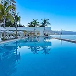 Stunning Beachfront Condo - Sea Views & Pools