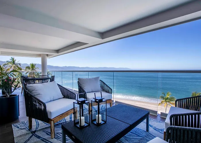 Upscale Corner Unit With Large Wrap Around Balcony And Pools
