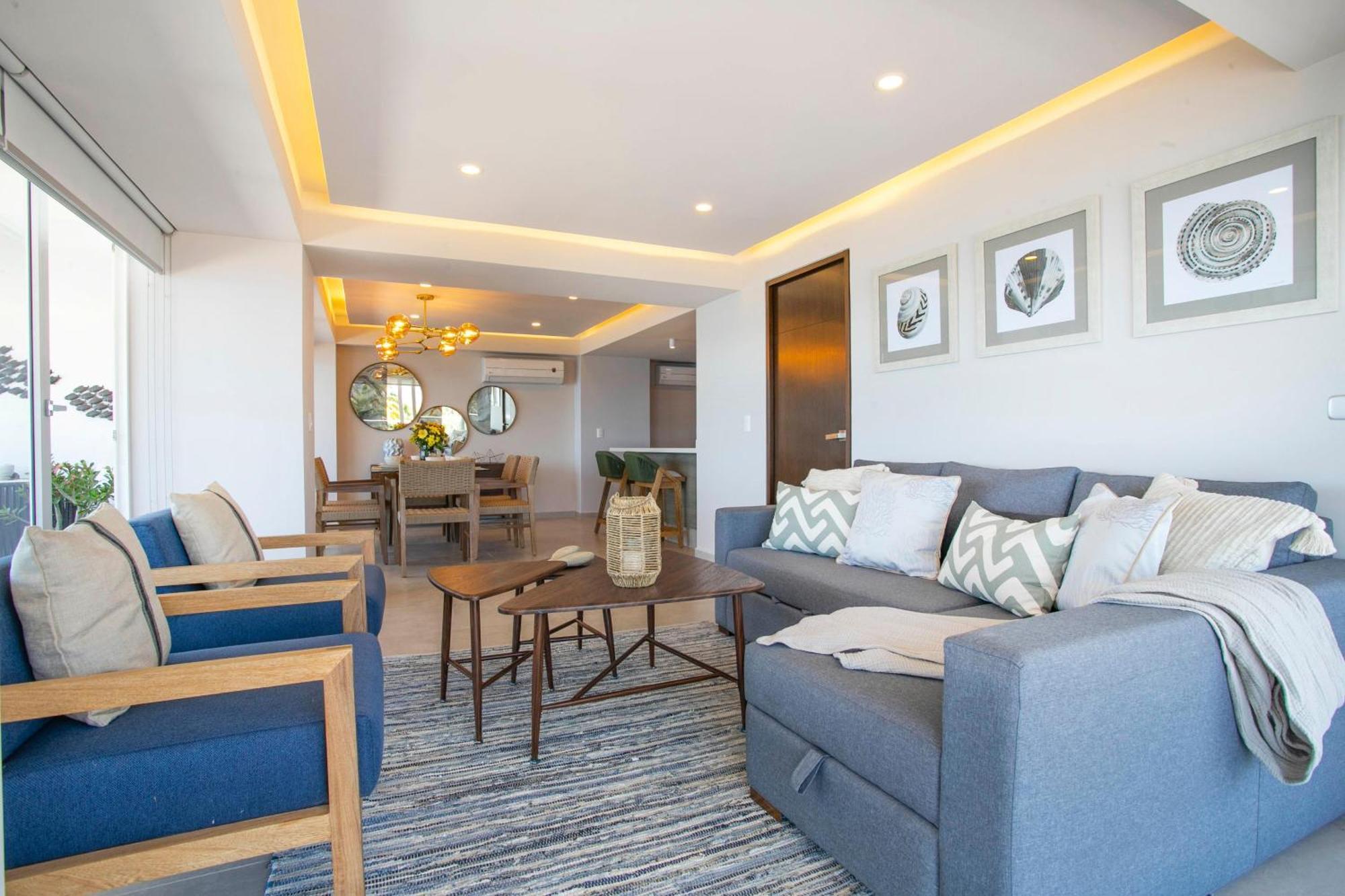 Upscale Corner Unit With Large Wrap Around Balcony And Pools