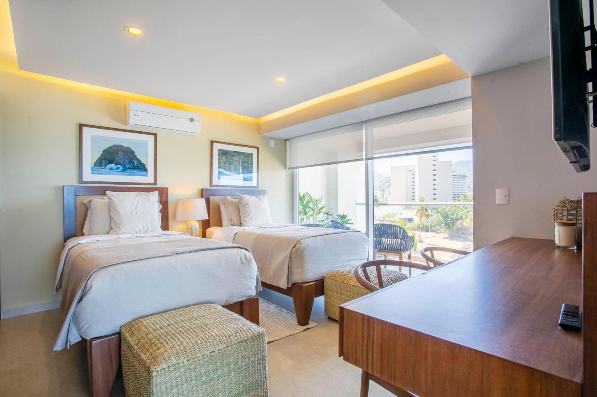 Upscale Corner Unit With Large Wrap Around Balcony And Pools Holiday home Puerto Vallarta