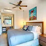 Top Floor Condo With Partial Ocean Views, Pools, Gym
