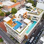 Top Floor Condo With Partial Ocean Views, Pools, Gym
