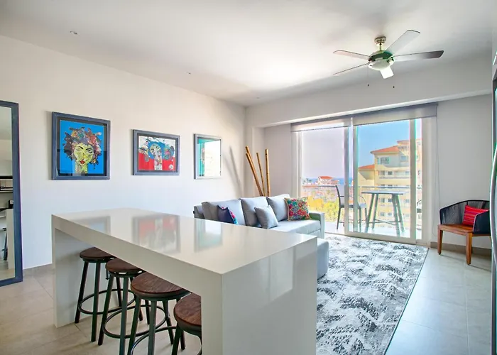 Top Floor Condo With Partial Ocean Views, Pools, Gym